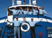 Fishermen aboard charter fishing boat at Charlotte Queen Adventures