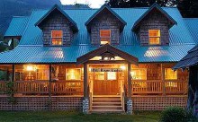 Night view of main lodge at Pitt River Lodge