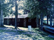 Guest cabin in the trees at Cormorant Lake Lodge