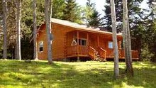 Log guest cabin at Country Haven Lodge