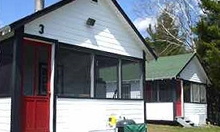 Guest cottages at Frog Rapids Camp