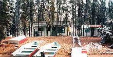 Guest cabins and boats at Close Lake lodge