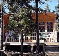 Guest cabin with deck at Pointer Lake Lodge