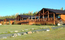 View of cabins and main lodge at Inconnu Lodge